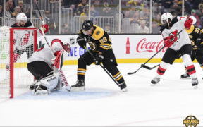 Bruins persevere win Devils